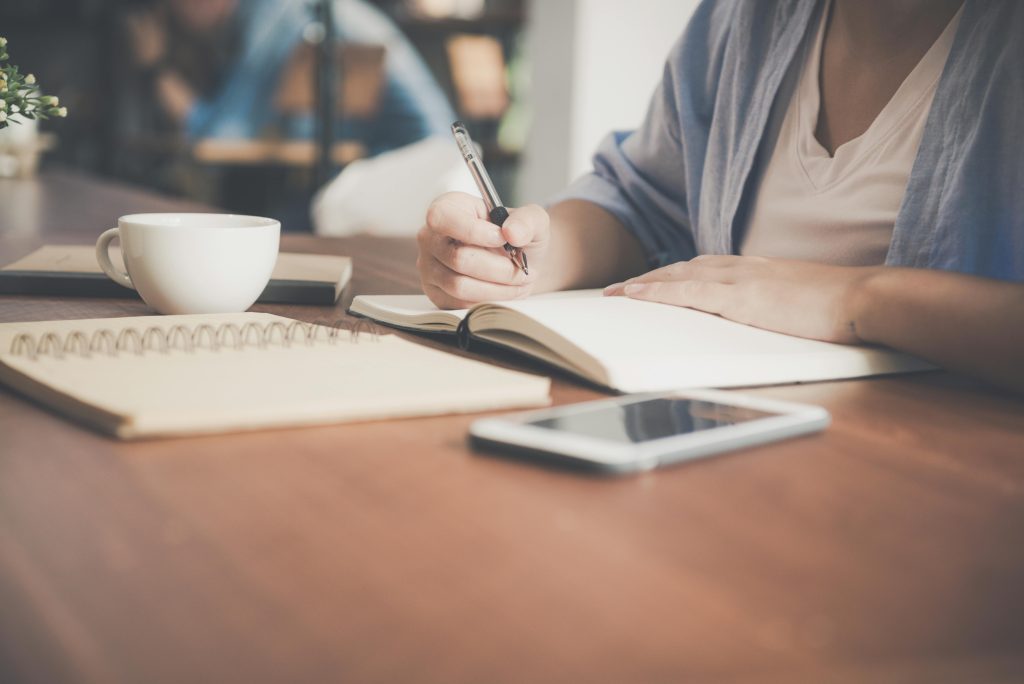 a woman at a desk working overtime